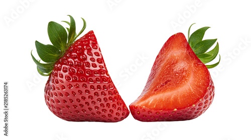 Fotografie Isolated fresh ripe red strawberry fruit with green leaves, one whole and one ha