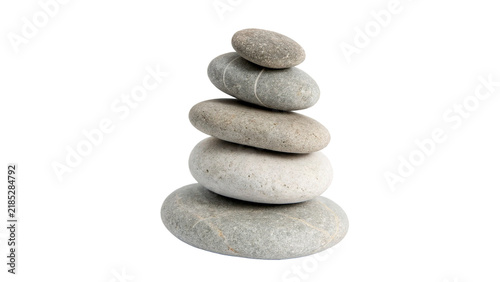 Balanced vertical stack of smooth grey pebble zen stones isolated on transparent background