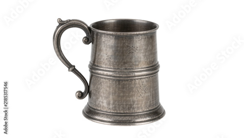 Bild auf Leinwand Antique pewter tankard with ornate handle and decorative engravings, isolated on