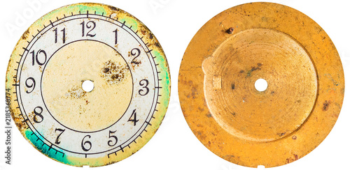 Obraz na plátně Isolated photo of rusty vintage worn green and biege colored clock or watch face on white background