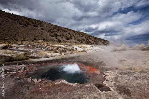 Cuadro en lienzo Erupting geothermal hot spring with steam in Sajama National Park Bolivia