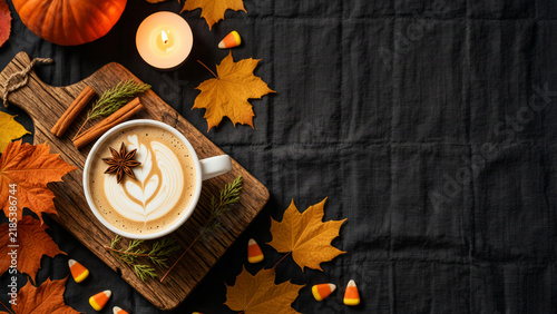 Cozy Autumn Pumpkin Spice Latte with Cinnamon, Candy Corn and Fall Leaves