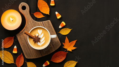 Cozy Autumn Pumpkin Spice Latte with Cinnamon, Candy Corn and Fall Leaves