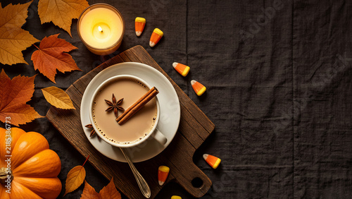 Cozy Autumn Pumpkin Spice Latte with Cinnamon, Candy Corn and Fall Leaves