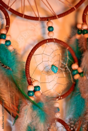Dreamcatcher and shadow, talisman, amulet, beautiful photo, magic, superstition, boho style.