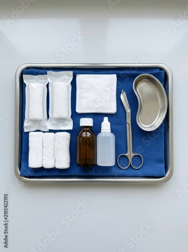 Medical surgical tray with sterile bandages gauze and instruments for wound care