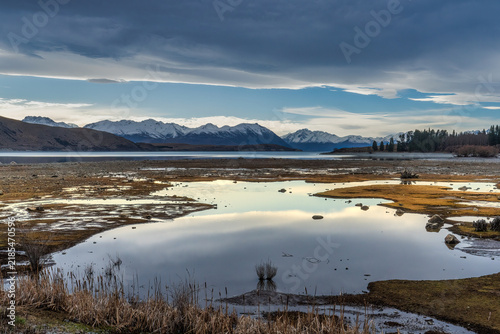 Views over Tekapo wetlands over Lake Tekapo and The snow covered Southern Alps