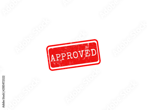 A bright red rectangular rubber stamp with the word Approved in white text, featuring a distressed ink texture suitable for business documents