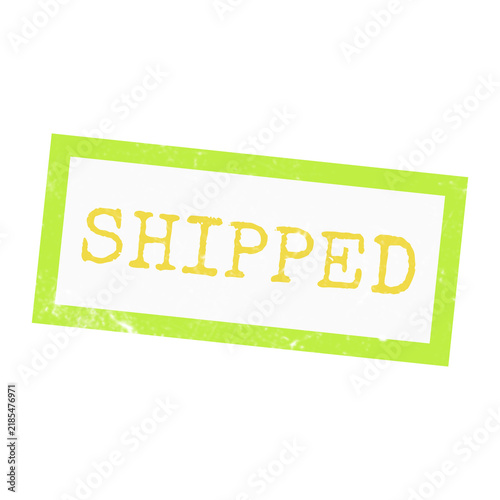 A tilted green rubber stamp with the word shipped in yellow text, featuring a textured grunge finish for logistics designs