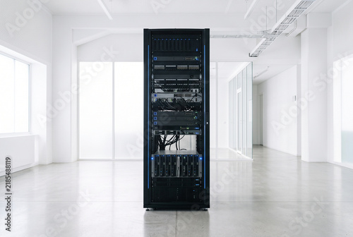 Sleek Unbranded Modular Server Rack Unit in Minimalist Bright Modern Interior