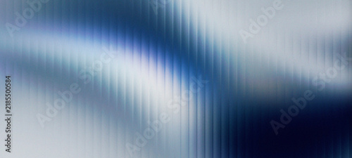 Metallic silver and blue frosted glass panel texture with vertical fluted lines creating a sophisticated industrial abstract background design.