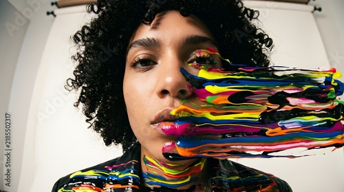Creative abstract portrait with surreal elements or flowing colors flawlessly illuminated