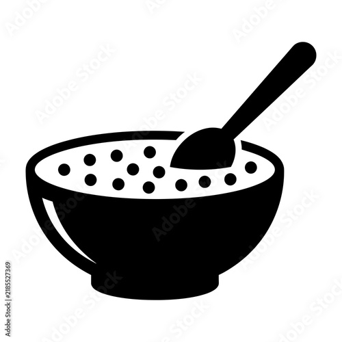 Black and white bowl of cereal with spoon