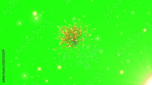 Golden firework bursts against a bright green screen background
