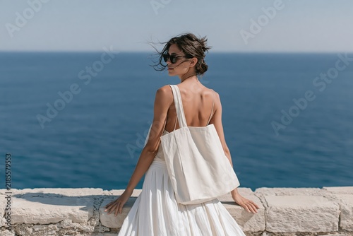 Candid summer fashion by the Mediterranean sea