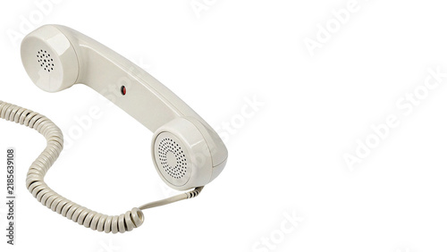 Принти на полотні Vintage white telephone handset receiver with curled cord wire retro communicati