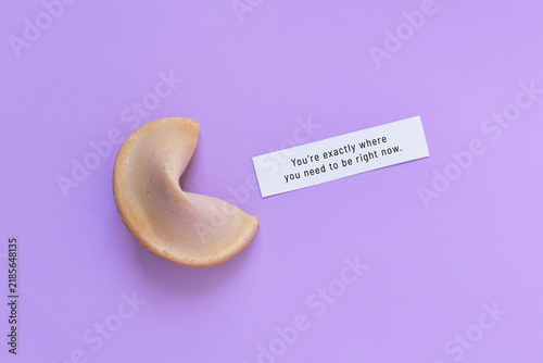 Fotografie Fortune cookie with motivational text on paper saying 'You’re exactly where you