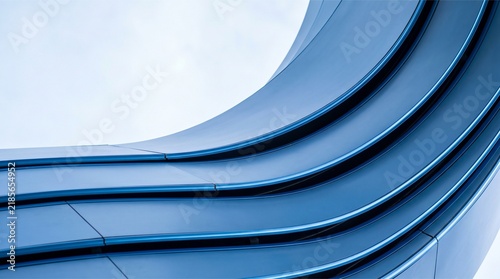 Abstract architectural detail of a curved blue metal structure with modern lines.