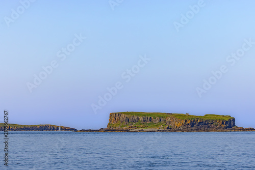 Quadro su tela View from the sea onto Cairn na Burgh Mor and the Treshnish Isles, islands in the Inner Hebrides, off the west coast of the Isle of Mull in Scotland