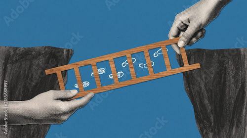 Vintage style hands holding a wooden ladder over a wide blue gap creating bridge connection