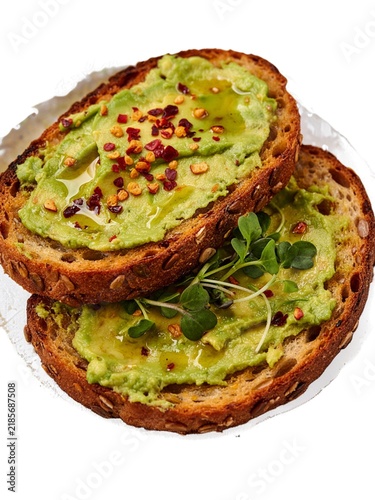 Healthy avocado toast with creamy mashed avocado, spicy red pepper flakes, and olive oil, isolated on a transparent background for a fresh and nutritious breakfast or light snack.