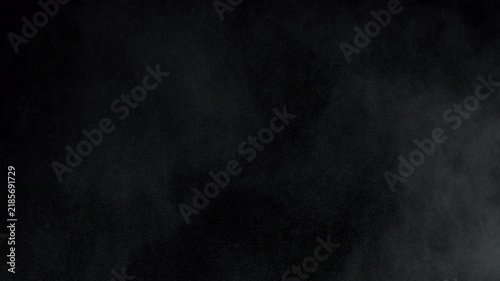 Super Slow Motion Shot of Dust Atmospheric Particles Floating in Air on Black at 1000fps.