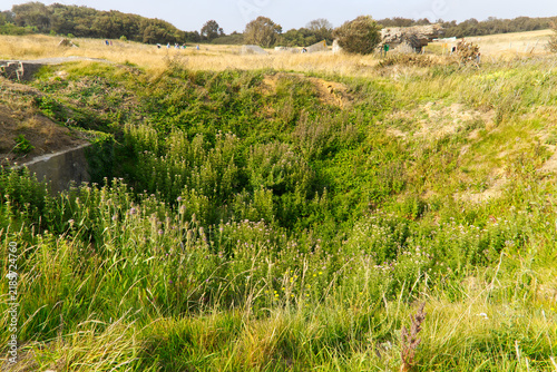Obraz na płótnie Pointe du Hoc landing site of D Day with scenic landscape and bomb craters on a summer day