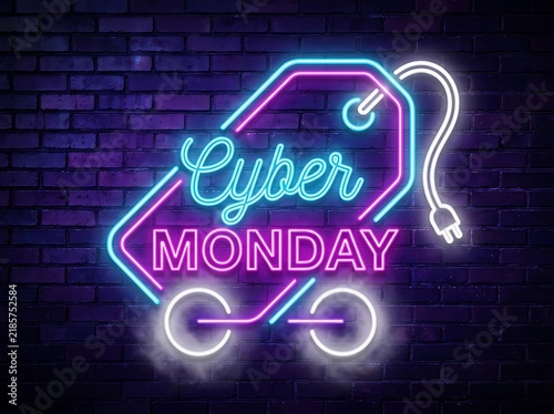 Cyber monday neon sign glowing on brick wall background