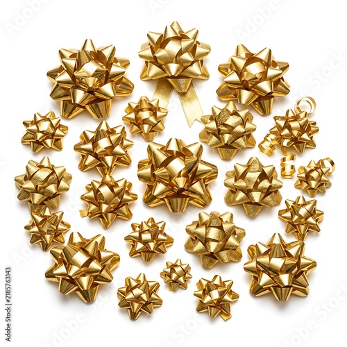 Set of Shiny Metallic Gold Gift Wrapping Bows Isolated on White Background.