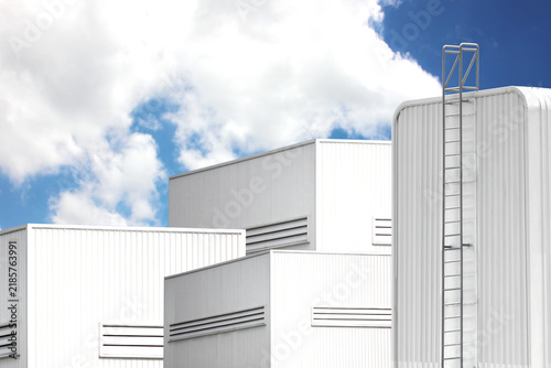 the factory using corrugate metal building design against blue sky white cloud