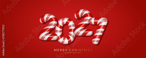 Happy New Year 2027 card. Christmas and New Year greeting card with candy cane numbers.