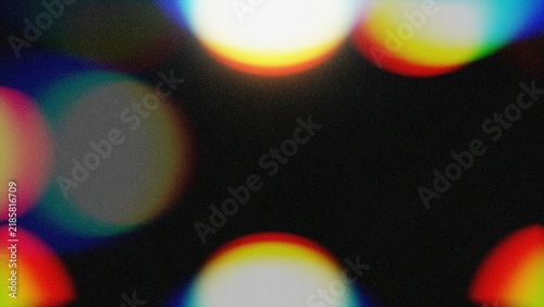 Grainy Rainbow Bokeh Light Leak Background with Circular Prismatic Spots and Heavy Film Noise