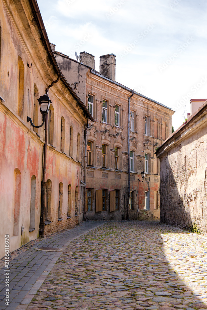 Fototapeta premium In the streets of Vilnius old town in early September in Vilnius in Lithuania