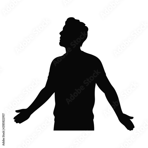 Young man silhouette standing with open arms looking upwards in wonder feeling free and calm