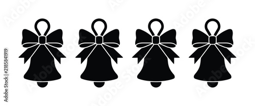 Four black silhouette christmas bells with decorative bows isolated on white