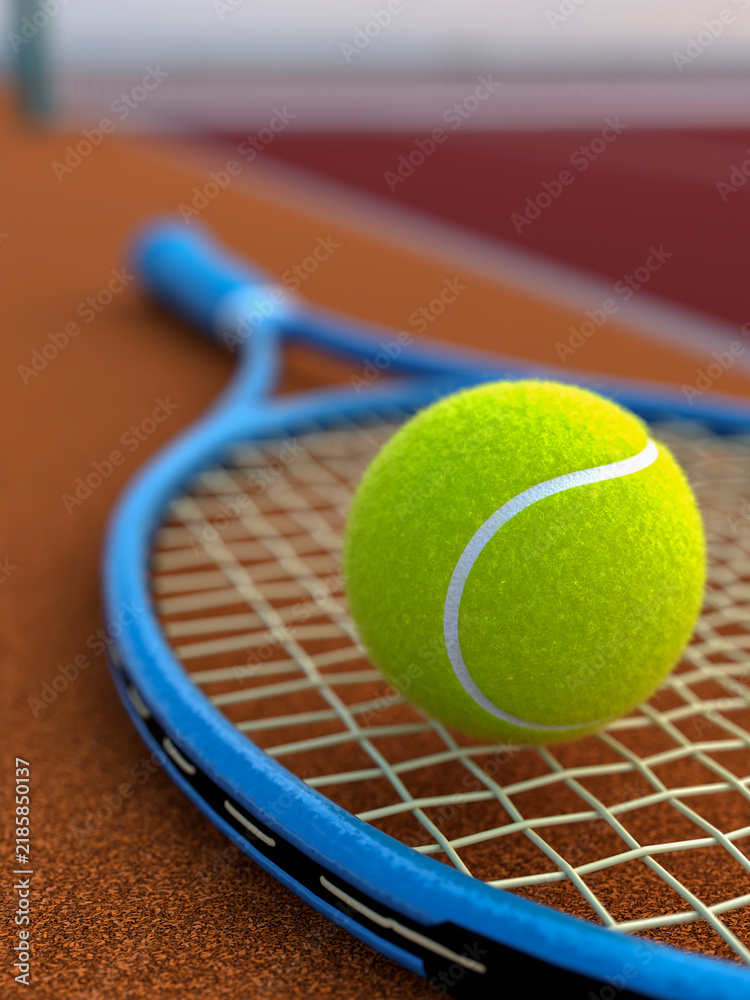 Obraz premium Close-up of a bright yellow tennis ball resting on a blue tennis racket strings