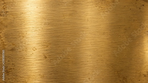 Brushed brass metal texture with warm golden tone