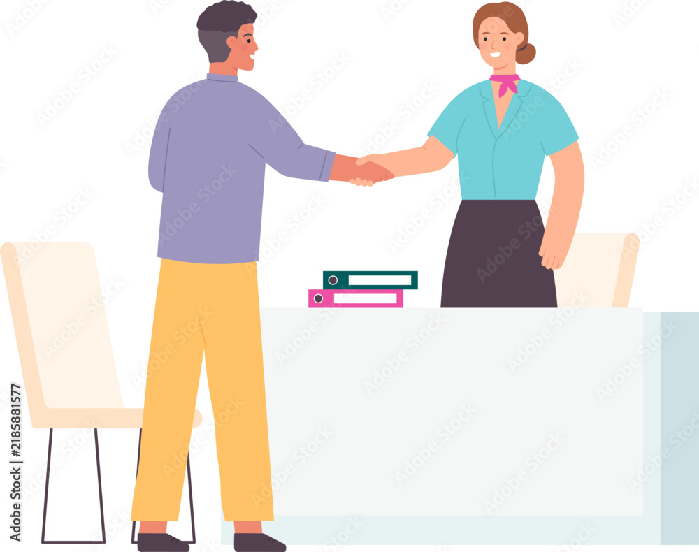 Obraz premium Business partners shaking hands over a desk, finalizing a successful meeting