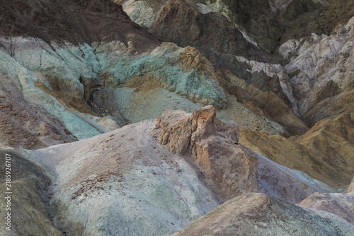 View of the colorful mineral deposits and rugged rock formations of Artists Palette in Death Valley, California, United States.