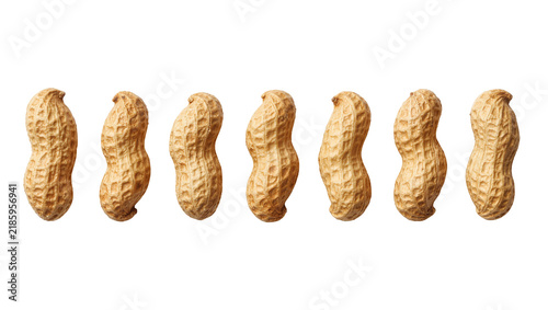 Foto Row of six unshelled peanuts, isolated on transparent background