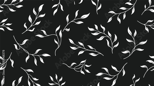 Flowing white leaves on a black background forming a repeating botanical pattern for textures and design projects.