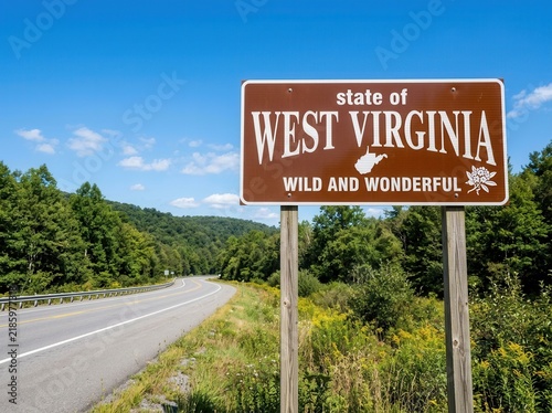 West Virginia Welcome Sign Along A Scenic Country Road