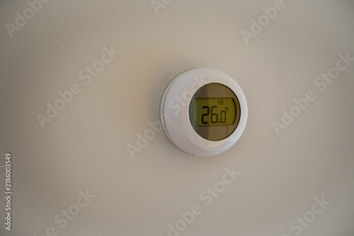 Fotografie Digital wall thermostat displaying 26 degrees Celsius