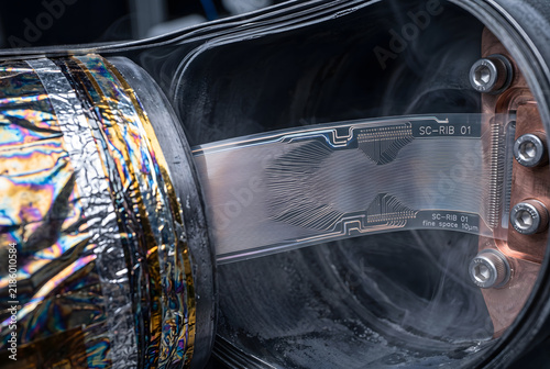 Macro Shot of Twisted Superconducting Ribbon Cable in Quantum Shielding Enclosure