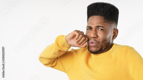 Fotografie Close up of young man with disgusted expression repulsing something isolated ove