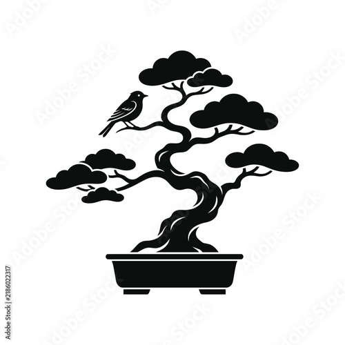 Bonsai tree in a ceramic pot with a bird perched on branch
