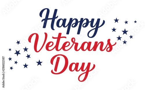 Happy veterans day text with blue and red handwritten calligraphy style font decorated with small dark blue stars