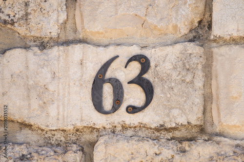 63 number on the wall