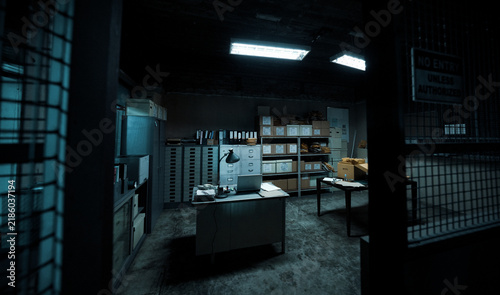 Foto Dimly Lit Storage Room with Desk and Filing Cabinets
