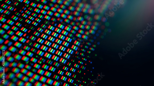 Close-up of Pixels: A macro shot revealing the intricate grid of red, green, and blue pixels on a digital screen, showcasing the building blocks of digital imagery.